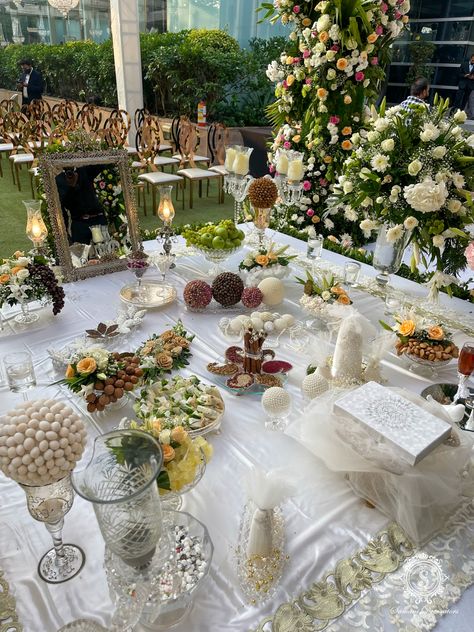 Adding a touch of elegance inspired by Persian influence - A Sofreh meaning a table or a spread covered with delicious delicacies and beautiful decorative items. A wedding feast that can only be described as grand. ✨❤️ #SamaniDecorators #themedecor #weddingdecor #persianweddings #persiandecor #decorideas #weddingdecoration #decorinspiration #inspiration #decorinspo #weddings #indianweddings #weddingday #engagementdecor #mehendidecor #eventplanners #carnival #weddingplanners #eventmanagement #re Engagement Table, Iranian Wedding, Persian Decor, Wedding Feast, Persian Wedding, Engagement Decorations, Wedding Stage, Table Set, Wedding Table