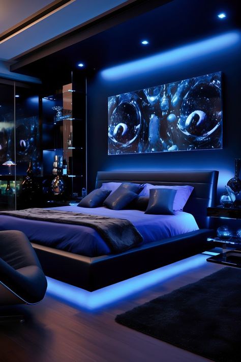 Luxurious modern bedroom in deep black and cobalt blue, featuring a queen-size platform bed, cobalt blue armchair, and spotlighting. Cobalt Blue Bedrooms, Midnight Bedroom, Midnight Blue Bedroom, Black Modern Bedroom, Luxurious Modern Bedrooms, Dark Blue Bedrooms, Bedroom Ideas For Men, Silver Room, Home Bedroom Design