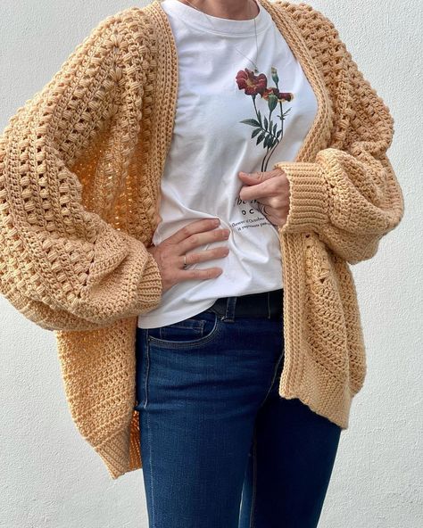 A woman wearing a hexagon crochet cardigan. Crochet Sweater Jacket Pattern Free, Solid Granny Hexagon Cardigan, Cardigan Crochet Pattern Free Women, Velvet Cardigan Crochet Pattern, Puff Stitch Cardigan, Hexicardigans Crochet Pattern Free, Free Easy Crochet Cardigan Patterns For Women, Hexagon Pattern Crochet, Cardigans Crochet Patterns Free