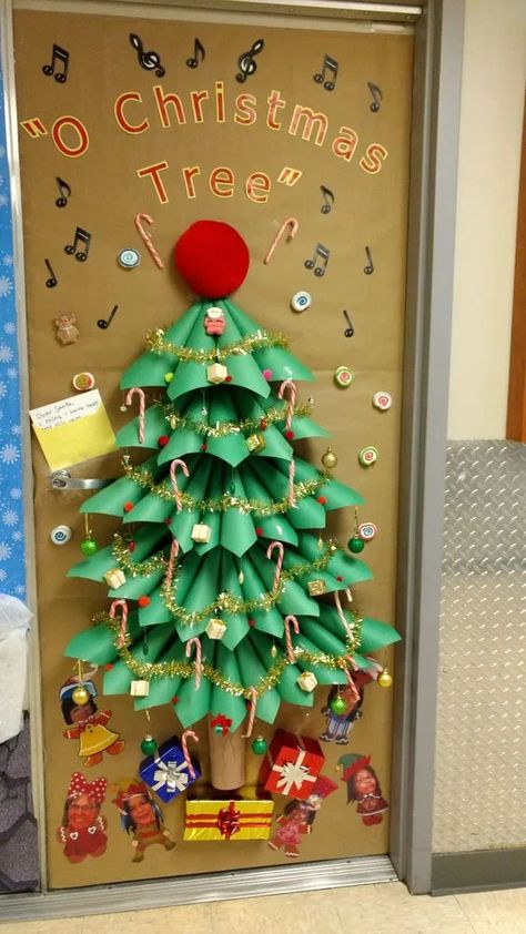 Over 40 DIY Christmas Door Decorations - A girl and a glue gun Christmas Tree On Door Classroom, Christmas Door Decorating Contest Apartment Diy, Christmas Decoration For Office At Work, Paper Christmas Tree Door Decoration, Christmas Door Ideas School, Bulitin Board Ideas Christmas, Christmas Decoration Door School, Rocking Around The Christmas Tree Door, Classroom Door Decor For Christmas