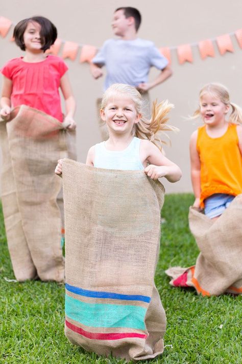 Have a backyard field day party with old school races! Dress up plain potato sacks with colorful painted stripes Diy Backyard Party, Backyard Field, Bond Fire, Races Dress, Diy Outdoor Party, Potato Sack Races, Potato Sacks, Backyard Party Games, Outdoor Yard Games