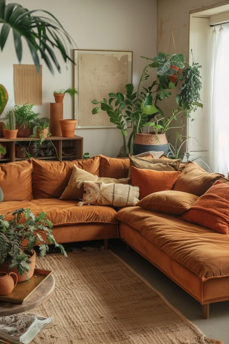 Living Room Arches Interiors, Autumn Aesthetic Cozy Living Room, Boho Artsy Living Room, Low Lounge Seating, Cozy Artsy Living Room, Hippy Interior Design, Earth Tone Couch, Terra Cotta Couch Living Rooms, Boho Living Room Earth Tones