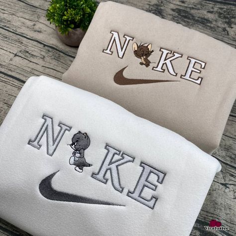 Cute Tom And Jerry Nike Embroidered Sweatshirts, Nike Embroidery Matching Couple Check more at https://viralustee.com/product/cute-tom-and-jerry-nike-embroidered-sweatshirts-nike-embroidery-matching-couple/ Matching Sweatshirts For Friends, Embroidered Sweatshirt Couple, Matching Nike Sweatshirts, Nike Couple Hoodies, Nike Custom Sweatshirts, Matching Hoodies For Couples Nike, Nike Embroidery Sweatshirt, Tom And Jerry Hoodie, Embroided Sweatshirt