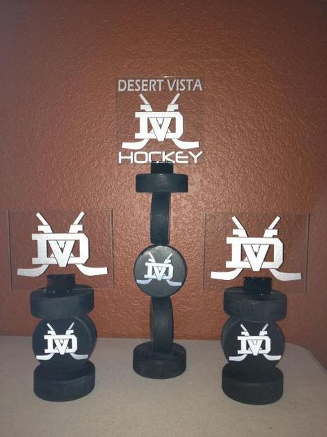 Hockey Center Pieces Field Hockey Centerpiece Ideas, Hockey Table Centerpieces, Hockey Banquet Centerpieces, Hockey Centrepieces, Hockey Banquet Ideas, Hockey Themed Centerpieces, Hockey Mvp Award Ideas, Hockey Puck Centerpieces, Hockey Centerpieces