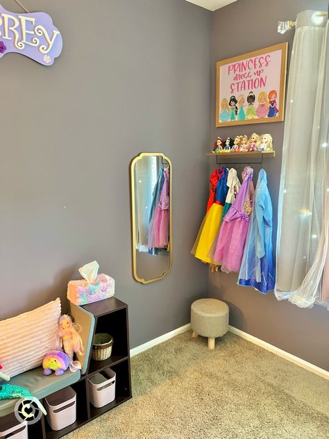 Princess Storage Ideas, Princess Dress Wall, Dress Up Stations Diy, Dress Up Room Ideas, Princess Dress Display, Small Dress Up Area, Diy Princess Dress Up Station, Dress Up Wall Ideas, Diy Girls Dress Up Station