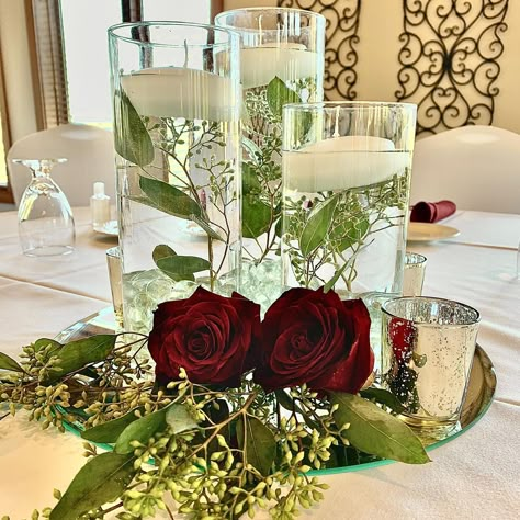 Burgundy wedding decor, burgundy wedding centerpiece, winter wedding ideas, wedding centerpiec, elegant wedding centerpiece, cylinder vase centerpiece, eucalyptus centerpiece, floating candle centerpiece November Centerpieces Wedding, Beauty And Beast Wedding Centerpieces, Wedding Centerpieces With Glass Cylinders, Maroon Table Centerpieces, Intimate Wedding Centerpieces, Bride And Groom Table Lights, Red And Green Wedding Centerpieces, Wedding Centerpieces With Cylinder Vases, Wedding Table Center Piece Decorations