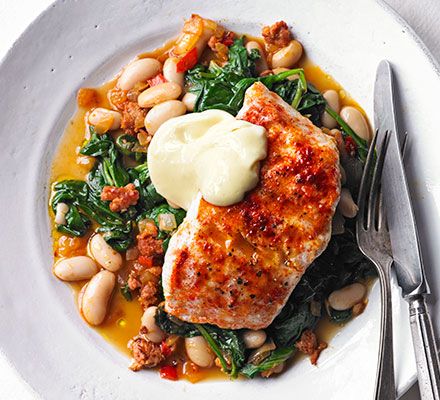 Grill white fish fillets and serve on top of chorizo, cannellini beans and spinach for a quick dinner that packs in 3 of your 5 a day Hake Recipes, Sauce Chorizo, Beans And Greens, Plats Healthy, Grilled Steak Recipes, White Fish, Cannellini Beans, Bbc Good Food Recipes, Fish Fillet