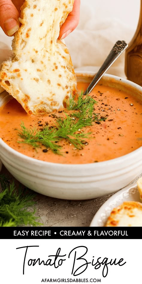 This homemade Tomato Bisque recipe turns classic tomato soup into something extra special. It's beautifully creamy, with fresh herbs and lots of tomato goodness. Grab some cheesy bread or your favorite grilled cheese for the ultimate comfort food meal! Tomato Bisque Recipe, Tomato Bisque Soup, Bisque Soup Recipes, Bread Bowl Recipe, Homemade Tomato Soup, Cozy Soups, Cream Of Tomato Soup, Bisque Soup, Tomato Soup Homemade