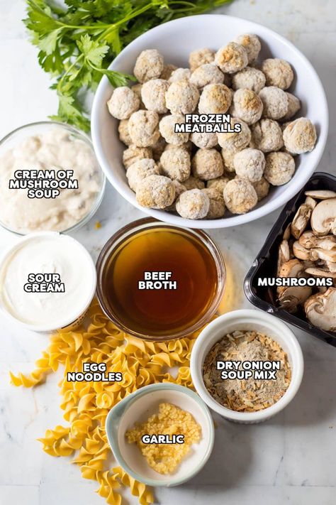 This easy slow cooker meatball stroganoff combines tender meatballs, cream of mushroom soup, sour cream, and a few other simple ingredients in a rich, creamy sauce served over egg noodles for all the classic flavors we love. Comfort food made easy in the crockpot! | www.persnicketyplates.com Meatballs And Egg Noodles Crock Pot, Soup Meatballs Recipe, Meatball Mushroom Soup, Meatballs With Cream Of Mushroom Soup Crock Pot, Meatball Stroganoff Easy Mushroom Soup, Meatballs And Egg Noodles Easy, Meatball Stroganoff With Cream Of Mushroom Soup, Mushroom Meatballs Crockpot, Dump And Forget Crockpot Meals