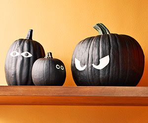 pumpkin decorating with glow in the dark paint | Scary Painted Pumpkins Scary Painted Pumpkins, Black Pumpkins, Pumpkin Paintings, Glow In The Dark Paint, No Carve Pumpkin Decorating, Halloween Pumpkins Painted, Dark Paint, Pumpkin Painting Ideas, Pumpkin Designs