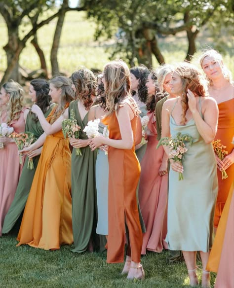 Thrifted Wedding Bridesmaid Dresses, Satin Bridesmaid Dresses Multi Color, Pink Orange Green Bridesmaid Dresses, Wildflower Colored Bridesmaid Dresses, Muted Rainbow Wedding Bridesmaids, Wild Flower Wedding Theme Bridesmaid Dresses, Pink Orange Green Wedding Bridesmaid Dresses, Green And Orange Bridesmaids, Mixed Color Bridesmaid Dresses Spring