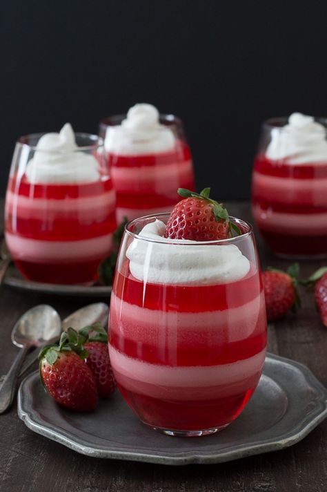 Layered Strawberry Jello Cups - a fun jello dessert to make for Valentine’s Day! Strawberry Jello Cups, Jello Cups, Jello Desserts, Parfait Recipes, Strawberry Jello, Valentine Desserts, Jello Recipes, Hari Valentine, Valentines Day Desserts