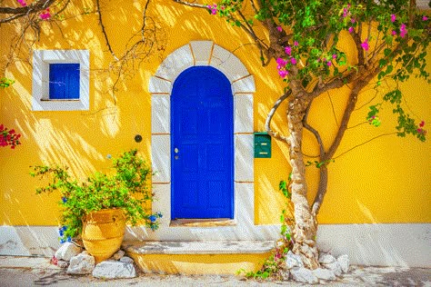 Colors that compliment Yellow - Mustard Yellow House with Blue Door Yellow House Exterior, Mediterranean Homes Exterior, Stucco Siding, Old Wooden Doors, Yellow House, Roof Colors, Yellow Houses, Front Door Colors, Mediterranean Home