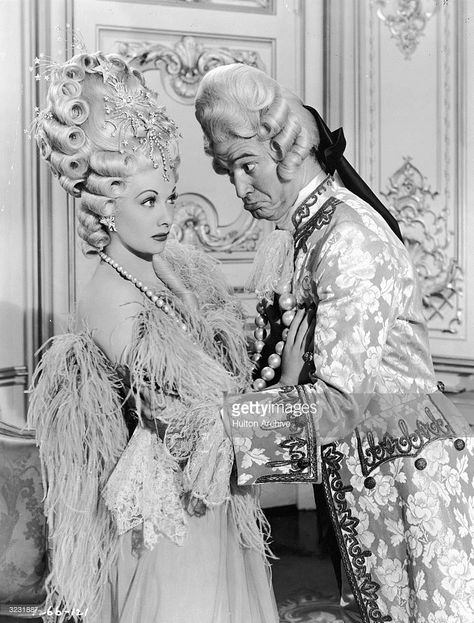 American actors and comedians Lucille Ball and Red Skelton face each other in a still from director Roy Del Ruth's film, 'Du Barry Was a Lady'. Both wear eighteenth century period costumes with elaborate wigs. Lucille Ball Desi Arnaz, Lucy And Ricky, Red Skelton, Desi Arnaz, Black And White Movie, Jayne Mansfield, Lucille Ball, Love Lucy, I Love Lucy