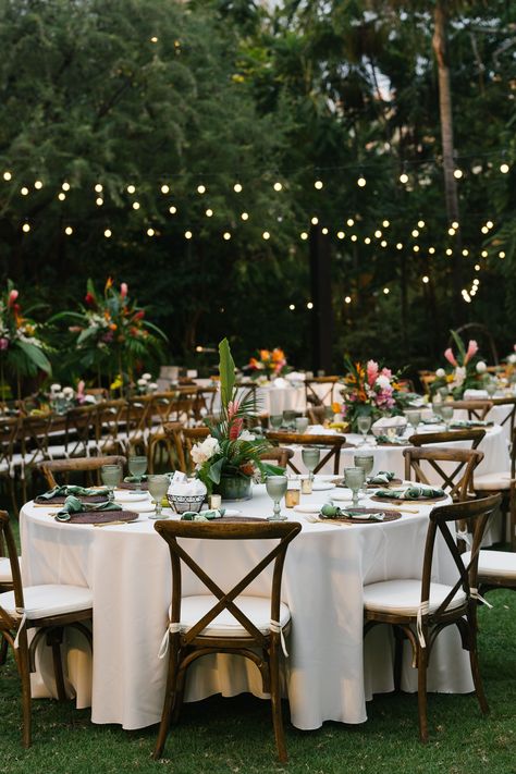 Garden wedding dream aesthetics! A beautiful setup with tropical flowers to give your garden wedding a tropical vibe. Bali Wedding Reception Decor, Plants In Wedding Decor, Costa Rica Wedding Reception, Rainforest Wedding Decorations, Wedding Beach Ideas Decoration, Tropical Inspired Wedding, Tropical Garden Wedding Ideas, Destination Wedding Mood Board, Tropical Plant Wedding Decor