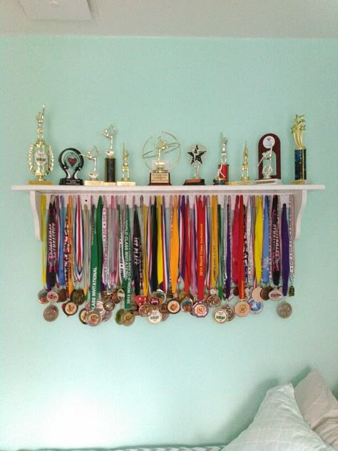 Made this for my daughter....Gymnastics Medals/Trophy display Award Display Ideas, Medal Display Ideas, Gymnastics Medal Display, Gymnastics Medals, Trophy Shelf, Gymnastics Room, Trophy Display, Ribbon Display, Kids Awards