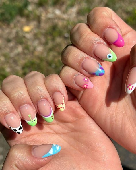 Sydney Burns | Toy Story X Monsters Inc. for Liv’s Disney trip🥰🤍 • • • #disneynails #disneynailart #toystorynails #monstersincnails #frenchtipnailart… | Instagram Disney Nails Monsters Inc, Cool Disney Nails, Disney Toy Story Nails, Toy Story French Tip Nails, Pixar Nails Simple, Disney Nails Toy Story, Toy Story Nail Ideas, Monsters Inc Nails Design, Monsters Ink Nails