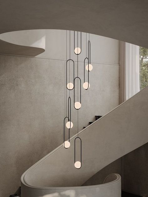 Stairs Chandelier Modern, Mezzanine Lighting Ideas, Pendant Lighting Hallway Stairs, Staircase Pendant Lights, Staircase Chandelier Modern Farmhouse, Modern Stairwell Lighting, Light Fixture Stairwell, Long Hanging Lights Stairs, Modern Stair Chandelier