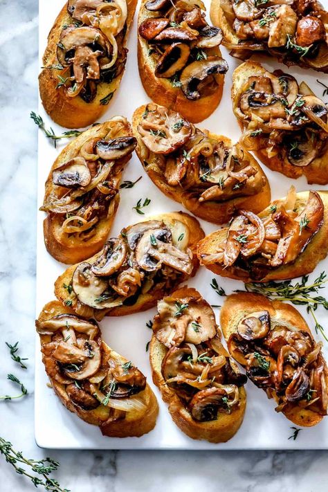 Caramelized Onion and Mushroom Crostini - foodiecrush .com Handheld Party Appetizers, Fancy Lunch Ideas, Winter Starters, Mushroom Crostini, Recept Sandwiches, Christmas Starter, Caramelized Onions And Mushrooms, Crostini Appetizers, Birthday 2023