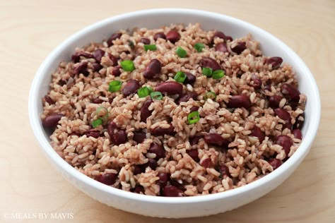 Rice and peas is a staple food in Jamaica and much of the Caribbean. This version of rice and peas uses canned beans, which makes it quicker and easier to make than dried beans. Rice And Peas Jamaican Canned Beans, Jamaican Rice And Peas With Canned Beans, Rice And Beans Meal, Brown Rice And Peas, Caribbean Meals, Beans And Rice Recipes, Jamaican Rice And Beans, Caribbean Rice And Beans, Rice And Peas Jamaican