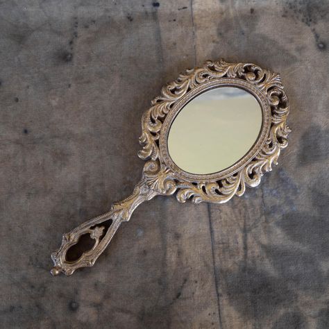 Victorian hand mirror Hand held mirror Antique gold handheld mirror Anniversary / birthday gift for wife Gold tone vanity mirror richly decorated, great dressing table decor, bathroom decor accessory. Could be a great gift idea for best friend / anniversary gift for wife / birthday gift / vintage gift for any occasions Retro ornate mirror has a hook for wall hanging  11" x 5" 28 cm x 13 cm Condition: good vintage condition with the minor traces of age and wear, patina (see photos). Please messag Hand Held Mirror, Gold Hand Mirror, Vintage Tattoo Sleeve, Vintage Hand Mirrors, Vintage Hand Mirror, Antique Hand Mirror, Vintage Hand Held Mirror, Ornate Hand Mirror, Vintage Handheld Mirror