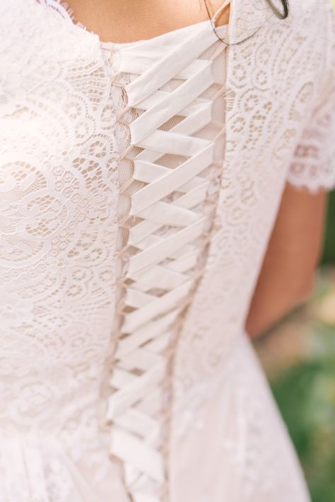 Close up details of lace up back wedding dress. Corset back wedding dress. Elizabeth Cooper Design modest wedding dress. Utah wedding photographer | Whitney Hunt Photography Wedding Dresses Lace Up Back, Lace Up Corset Back Wedding Dress, Corset Wedding Dress Vintage, Wedding Dress Corset Back, Wedding Color Theme Ideas, Lace Up Back Wedding Dress, Best Wedding Themes, Dress Corset Back, Pink And Burgundy Wedding