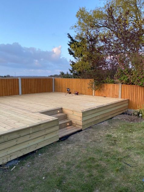 A decking build Project to turn an unused, overgrown part of the garden into an area to entertain and unwind on a summers evening. Raising the decking helped to take advantage of the stunning views across the fields but also to make it a focal point of the garden The Before    This was the top of the garden when we moved in and we knew we wanted to make something of what was behind this untidy hedgerow Hedge Removal     First task was to remove the hedgerow which had some pretty deep r… Raised Outdoor Deck, Raised Garden Decking Ideas, Raised Decking With Steps, Decking At Back Of Garden, Decking And Grass Garden, Decking With Steps To Garden, Decking Sloped Garden, Large Decking Area Ideas, Backyard Raised Deck