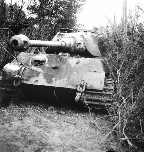 Pz.Kpfw.VI Tiger Ausf B  "Porsche" turret "111"  of s.Pz.Abt.503 that was abandoned in an orchard near Le Billot Normandy 18 August.1944 Tiger 2, Battle Of The Bulge, King Tiger, Panther Tank, Soviet Tank, Tiger Ii, Wwii Photos, Tank Destroyer, Tiger Tank