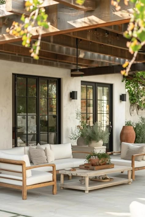 10 Chic Modern Farmhouse Patio Ideas for 2023 Gabled Patio Cover Roof Ideas, Modern Rustic Outdoor Patio, Modern Farmhouse Outdoor Living, Modern Farmhouse Patio Ideas, Modern Farmhouse Outdoor Patio, Wood Pergola Patio, Modern Farmhouse Patio, Farmhouse Patio Ideas, Backyard Porch Ideas