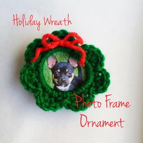 19 Cozy Crochet Christmas Ornaments | FaveCrafts.com Crochet Christmas Photo Frame, Crochet Photo Frame Ornaments, Crochet Photo Ornaments, Crochet Picture Frames Free Pattern, Crochet Christmas Tree Decorations, Xmas Photo Frames, Free Christmas Crochet Patterns, Crochet Christmas Decor, Free Christmas Crochet