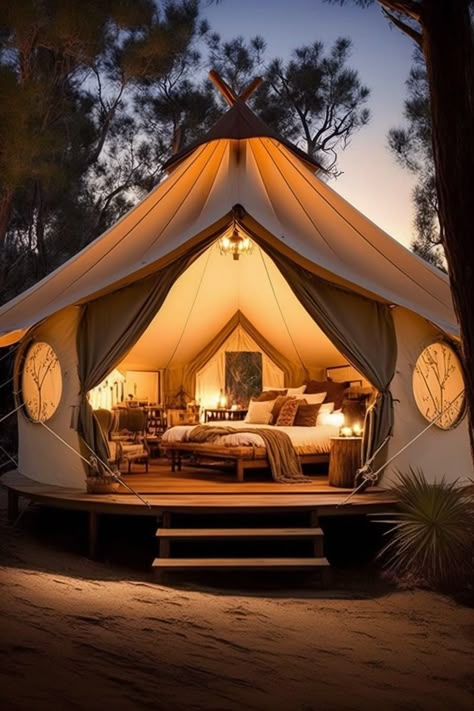 A luxurious glamping site that doesn't skimp on comfort, featuring plush cushions, a cozy fire pit, and high-end amenities. Glamping Business, Tents Camping Glamping, Bnb Ideas, Tent Living, Bell Tents, Camp Ground, Resort Ideas, Glamping Tent, Glamping Tents