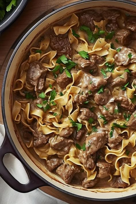 Make the perfect, creamy Dutch oven beef stroganoff with this easy and flavorful recipe. Dutch Oven Beef Stroganoff, Oven Beef Stroganoff, Chuck Roast Dutch Oven, Oven Steak Recipes, Dutch Oven Meals, Dutch Oven Recipes Cast Iron, Dutch Oven Recipe, Dutch Oven Beef, Le Creuset Recipes