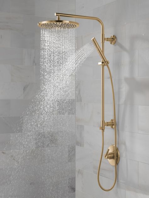 Emerge® 26~ Round Shower Column in Lumicoat® Champagne Bronze 58820-CZ-PR | Delta Faucet Showers With Brass Fixtures, Soft Brass Bathroom Fixtures, Gold Shower Head And Faucet, Shower Head System, Brass Shower Fixture, Delta Champagne Bronze Bathroom Showers, Gold Lighting Bathroom, Master Shower Faucet Ideas, Aged Brass Shower Fixtures