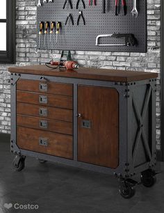 This sturdy, industrial-style inspired rolling workbench is the ideal blend of rugged powder-coat steel with a solid wood-top.  A rich hand-applied finish sets off this workbench, offers handsome practicality to your work shop, garage or any creative work space you can imagine. Meja Industrial, Rolling Workbench, درج السلم, Work Benches, Welded Furniture, Tool Stands, Vintage Industrial Furniture, Garage Cabinets, Work Bench