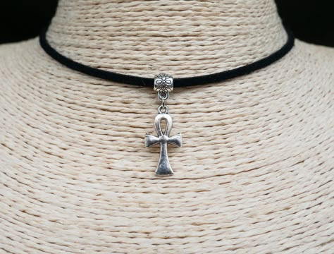 "Ankh Cross Necklace Key of Life Cross Necklace Egyptian Necklace Pendant Necklace Unisex Jewelry Black Suede Necklace ~ A boho necklace with metal pendant. - Made of metal and cord. ~ Black colour cord, 12\" shortest length. ~ Clasp and 2\" extender chain to adjust to you. ~ Made with the utmost care to enjoy it as long as possible. All jewelries are are in stock and ready to be shipped within 1-2 business day from ordering to dispatch. Please note these times increase during Christmas & busy p Bohemian Ankh Necklace In Metal, Adjustable Cross Necklace For Festivals, Adjustable Silver Ankh Necklace, Adjustable Silver Cross Choker, Ankh Jewelry, Suede Necklace, Cord Choker, Egyptian Necklace, Ankh Necklace