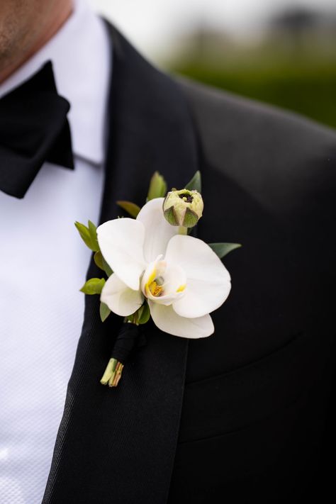 Orchid Boutonniere for Devon. Flowers: @rosehipsocial Orchid Winter Wedding Bouquet, All Orchid Bouquet, Small White Orchid Bouquet, Orchids Flower Bouquet, Orchid Groom Boutonniere, Black Orchid Bouquet, Wedding Orchids Centerpieces, Wedding Flowers With Orchids, Orchid Aisle Decor