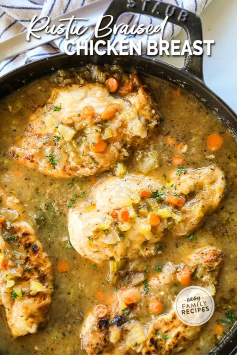 This rustic braised chicken breast recipe is a one-pan dish that promises juicy and tender chicken infused with savory flavors. It's perfect for an easy and delicious family dinner for busy weeknights. The simple step of deglazing the pan with a splash of white wine adds depth to the dish, and you'll have a flavorful masterpiece that's sure to impress. Enjoy the ultimate weeknight meal that's both easy to make and delicious. Rustic Braised Chicken, Recipes For Braising Pan, Savory Chicken Breast Recipes, French Chicken Breast Recipes, Braised Chicken Thighs Boneless, Braised Chicken Thigh Recipes, Chicken Breast Dutch Oven Recipes, Chicken Breast In Dutch Oven, Split Chicken Breast Recipes