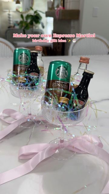 Amber Capps on Instagram: "A make your own espresso martini gift idea✨  I bought a set of coupe glasses from Amazon, tied a ribbon around the bottom of the glass + filled them with irredescent crinkle paper.   I used mini glass bottles and filled them with espresso beans to garnish with, added a can of espresso, mini bottles of vodka and coffee liqueur (I used Bailey’s because it’s the closet I could find in a mini bottle - I would normally use Kahlua ☕️) to each glass.   They were the perfect birthday gift for 2 of my friends who love espresso martinis! (+ so easy to make!)  . . . . . . #espressomartini #espresso #giftideas #giftideasforher #amazongiftideas #amazongiftideas #birthdaygifts #martinicocktail #giftsforher #easygiftideas #coupeglass #amazonfinds" Cute Alcohol Gift Ideas, Friend 21 Birthday Gift Ideas, Martini Glass Gift Ideas, Cute Drink Gift Ideas, Expresso Martini Gift Ideas, Espresso Martini Party Favors, Cute Birthday Gift For Best Friend, Mini Wine Gift Ideas, Mini Prosecco Bottles Gift