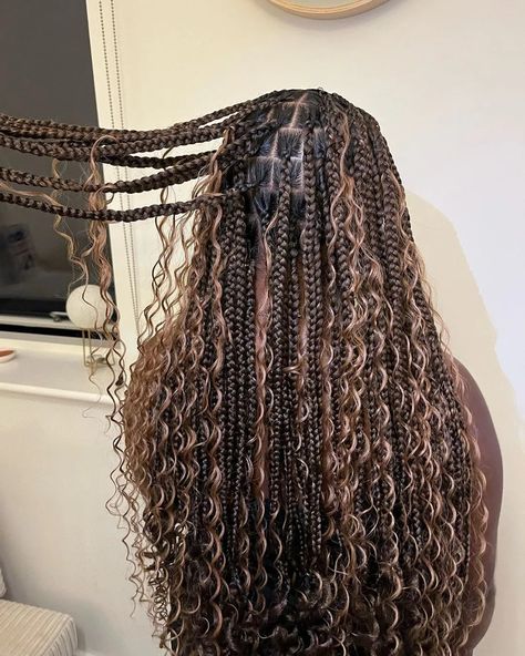 55 Goddess Braids Hairstyles Perfect for Summer 2024 | Glamour Knotless Braids With Curly Strands, Highlighted Goddess Braids, Full Goddess Knotless Braids, Medium Sized Goddess Braids, Boho Knotless Braids Extra Curls, Goddess Braids White Girl, Knotless Goddess Box Braids With Curls, Dark Brown Boho Knotless Braids, Brown And Black Goddess Braids