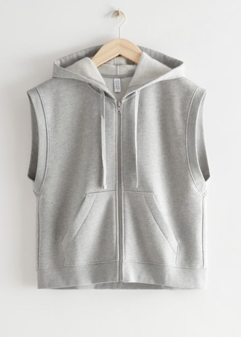 Sleeveless drawstring zip hoodie with a boxy silhouette and duo pockets. Organic cottonRibbed sleeve opening and hemLength of hoodie: 57cm / 22.4" (Size S) Chaleco Casual, Hippie Style Clothing, Women's Sweatshirts, Fashion Story, Print Pullover, Casual Style Outfits, Apparel Design, Fall Winter Outfits, Grey Hoodie