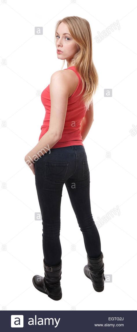 Download this stock image: woman looking over shoulder - EGTG2J from Alamy's library of millions of high resolution stock photos, illustrations and vectors. Pose Reference Looking Over Shoulder, Looking Over The Shoulder Pose, Woman Looking Over Shoulder, Looking Over Shoulder, Stock Photos Woman, Art Help, Female Pose Reference, Body Reference Poses, Standing Poses