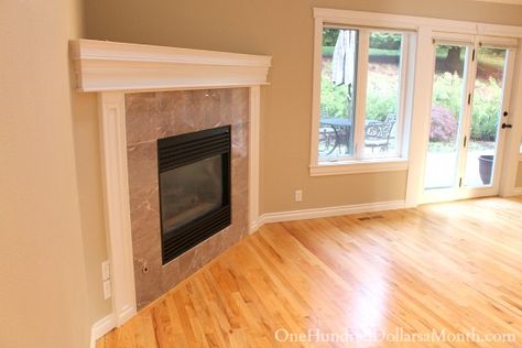 Corner Fireplace Redo, Corner Fireplace Surround Ideas, Ideas For Corner Fireplaces, Built In Next To Corner Fireplace, Angled Wall Fireplace, Diagonal Fireplace, Over Corner Fireplace Decor Ideas, Fireplace Makeover Corner, Corner Fireplace Makeover Before After