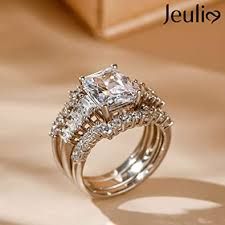 https://encrypted-tbn0.gstatic.com/images?q=tbn:ANd9GcTLiFWfZkQmymmIDcf_8Nb3-9rnUVXtDnDxoQ&usqp=CAU 10 Year Wedding Ring, Wedding Ring Upgrade, Asscher Cut Diamond Engagement Ring, Jeulia Jewelry, Expensive Wedding Rings, Ring My Bell, Emerald Cut Diamond Engagement Ring, Wire Jewelery, Victorian Engagement Rings