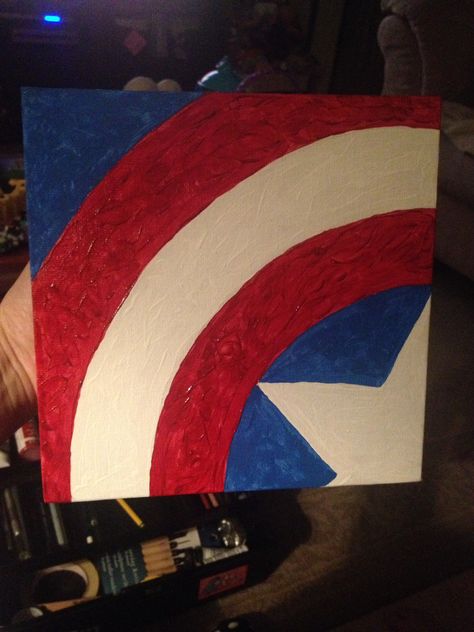 Captain America Shield I painted in acrylic paint on an 8x8 canvas board for one of my employees.  Not too shabby for free hand.  Avengers Assemble Captain America Painting, America Painting, Creative Painting Ideas, Avengers Painting, Mini Tela, Kids Canvas Painting, Marvel Paintings, Cute Easy Paintings, Kids Canvas Art