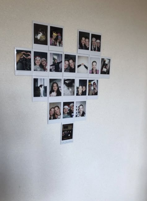 Poloroid Heart On Wall, Ways To Put Pictures On Wall, Poloroid Pictures Ideas Fairy Lights, Heart Made Out Of Pictures On Wall, Cute Ways To Display Polaroids, Polaroid Craft Ideas, Polaroid Design Ideas, Heart Polaroid Wall, Heart Picture Collage Layout