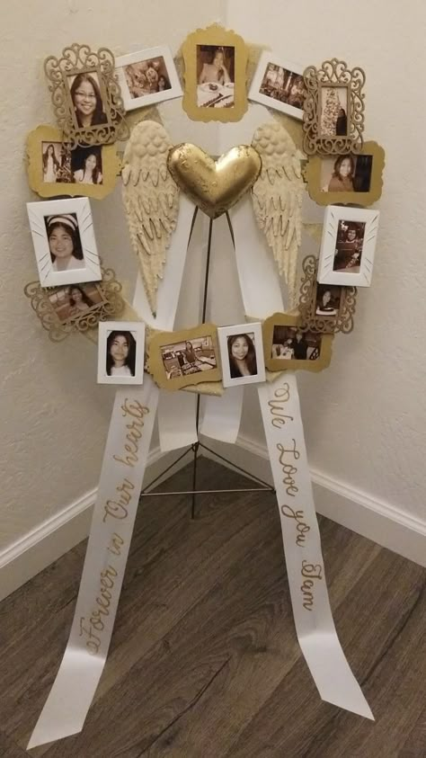 A collection of pictures in ornament frames, spray painted to match the gold heart and angel wings. Attached to a floral wire wreath wrapped with burlap. With floral wire stand. Memorial Picture Wreath, Memorial Ideas For Class Reunion, Diy Rememberance Ideas, Angelversary Ideas, Remembrance Party Ideas, Birthday Memorial Ideas, Memorial Picture Board, Memorial Decorations, Memorial Wreath