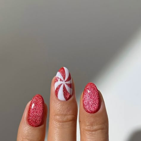 Marnie ♡ on Instagram: "christmas candy cat eye nails 🍬🎄🍭❤️🍫🎅✨  rings from @monicavinader 🫶   #nails #nailinspo #nailart #naildesign #christmasnails #xmasnails #holidaynails #nailsofinstagram #winternails #novembernails" December Nails Candy Cane, Gelx Inspo Nails Christmas, Cat Eye Candy Cane Nails, Gel Nail Designs Christmas Short, New Nail Designs 2024 Winter, Red Chrome Candy Cane Nails, Cute Short Christmas Nails Candy Cane, Christmas Lights Gel Nails, Cat Eye Nail Christmas