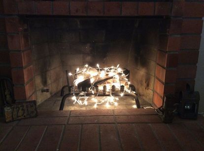 your fireplace sans fire , christmas decorations, fireplaces mantels, lighting, seasonal holiday decor Fireplace Lights, Empty Fireplace Ideas, Empty Fireplace, Glow Bottle, Unused Fireplace, Christmas Lights Inside, Fresh Christmas Wreath, House Candle Holder, Spice Combinations