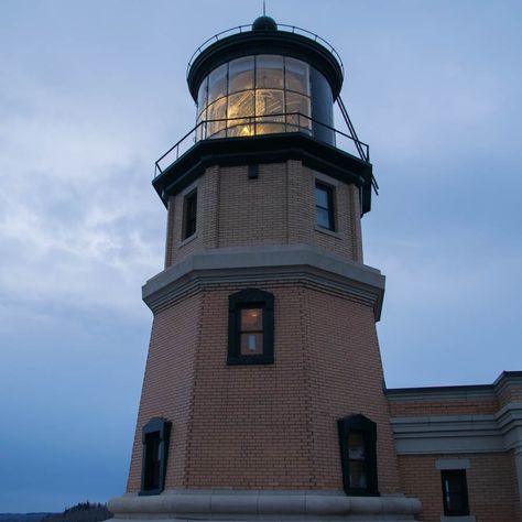 High above dark grey waters, Split Rock Lighthouse stands as a testament to the danger and romance of sailing on the Great Lakes. Each year thousands of people visit this Minnesota icon but November 10th is the only day to see the lighthouse shining across Lake Superior. http://www.umami.site/section/stories/travel/see-split-rock-lighthouse-shine-across-lake-superior/ Splitrock Lighthouse, Site Section, Split Rock Lighthouse, Minnesota Historical Society, Cartoon Inspiration, Split Rock, Lighthouse Photos, Lighthouse Pictures, Safe Harbor