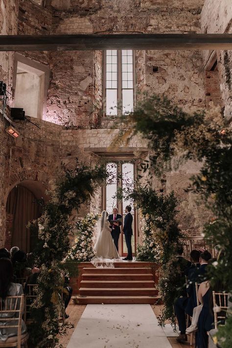 Lulworth Castle wedding venue in Dorset with botanical floral arrangements and columns decorating the venue Green Mismatched Bridesmaid Dresses, Sage Green Colour Palette, Flower Columns, Wedding Cake Green, Retro Wedding Cake, Fort Wedding, Vintage Wedding Venues, Wedding Isles, Bella Wedding